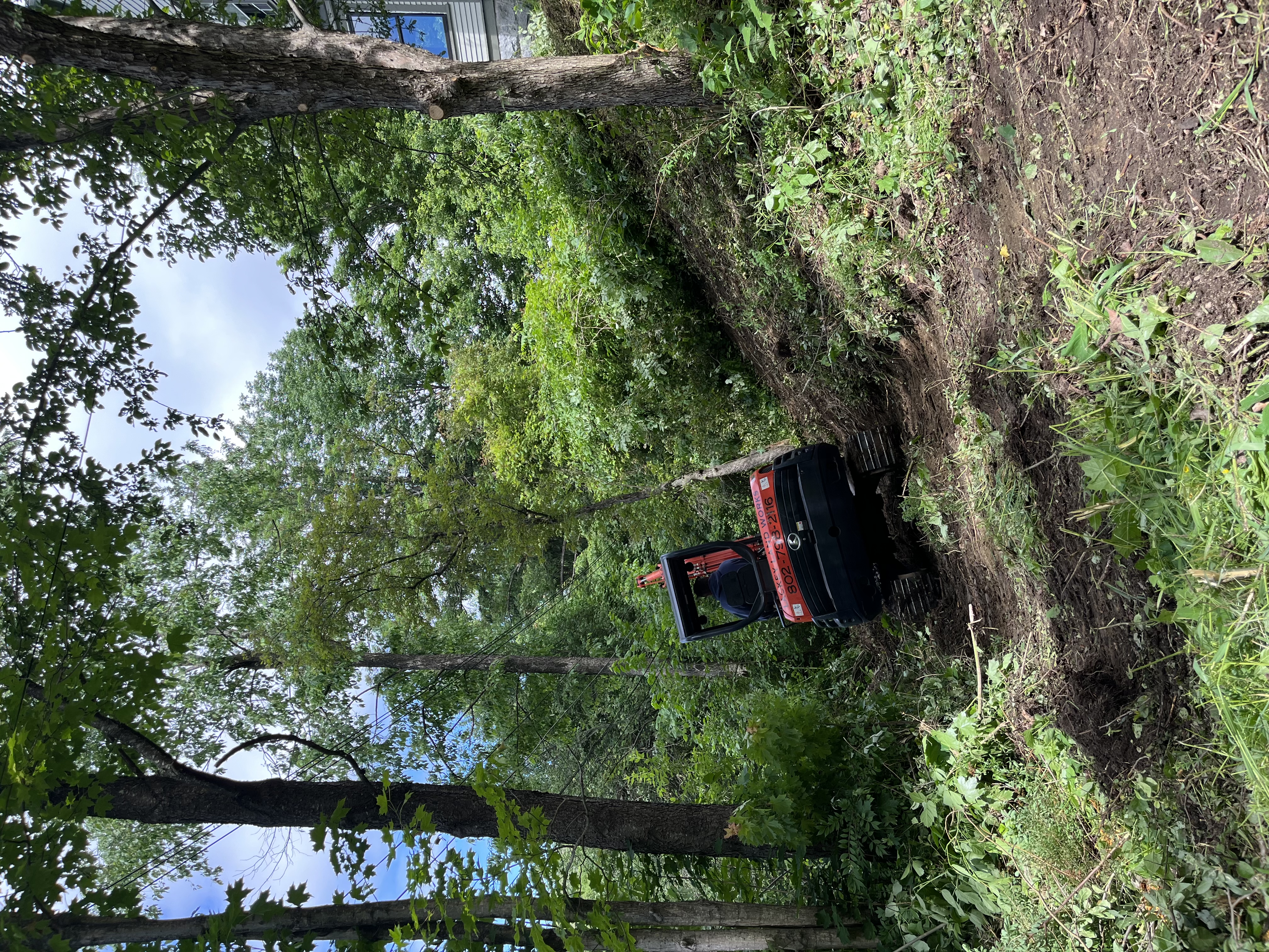 Lackey Land Works on the job